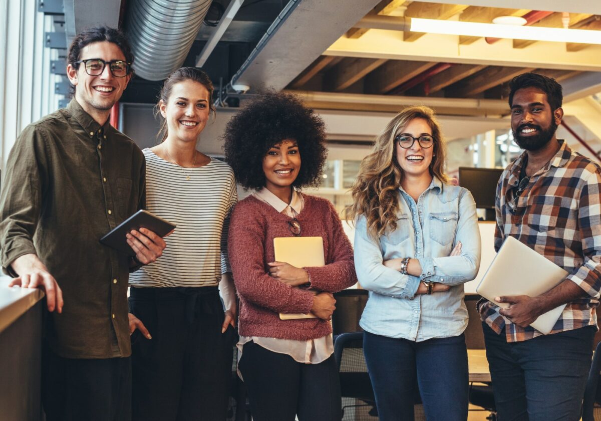 Diverse team of business colleagues smiling