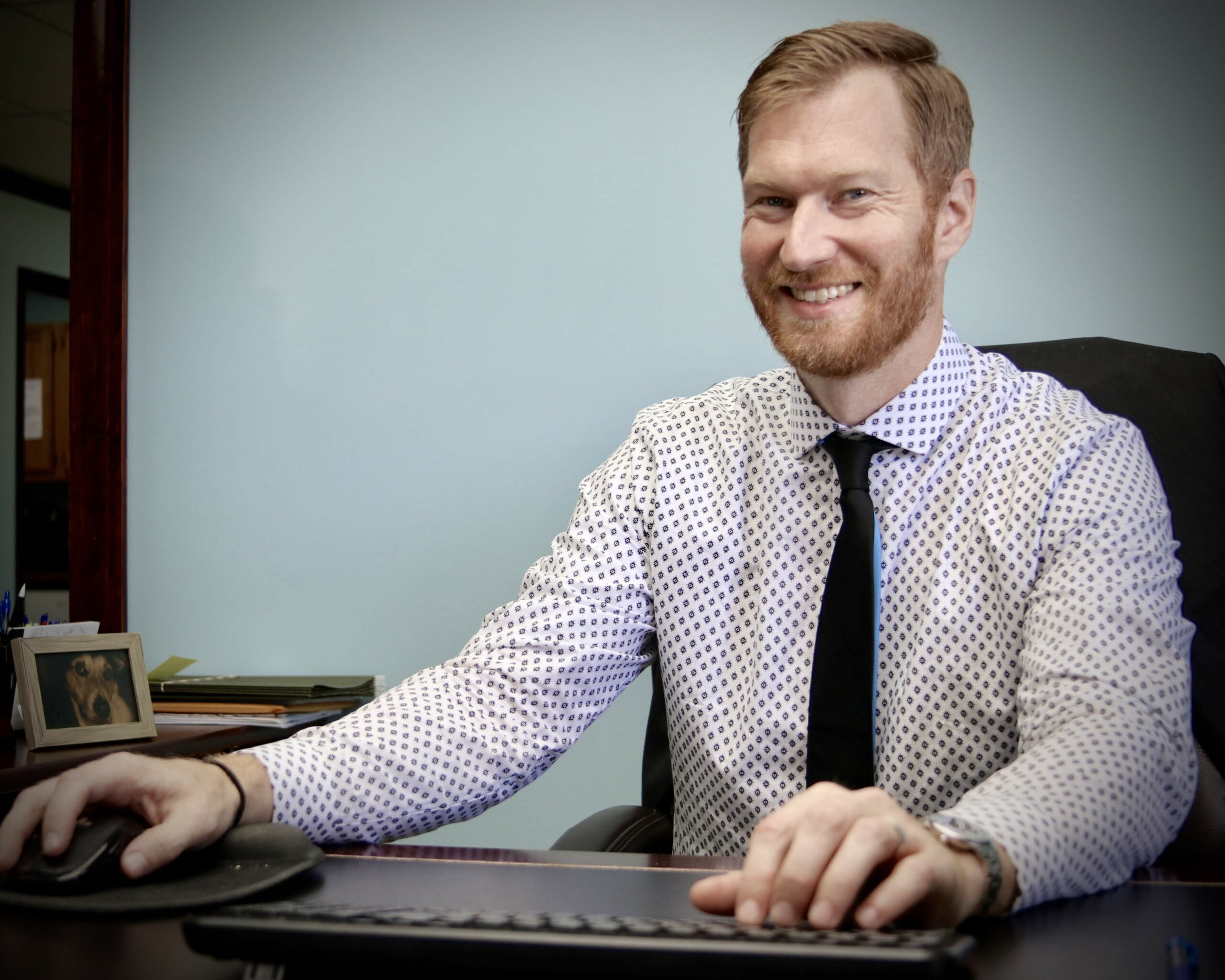 Joe Sitting at Desk Pattar & Co. CPA